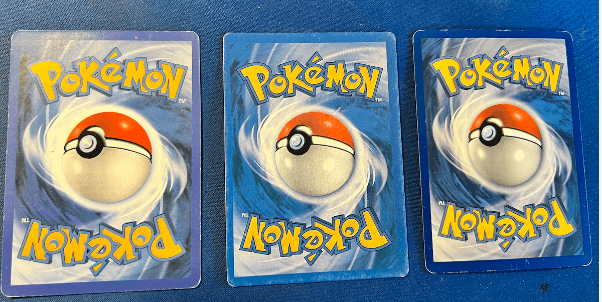 Pokemon Cards - REAL Pokemon Tin VS FAKE Pokemon TIn!! 