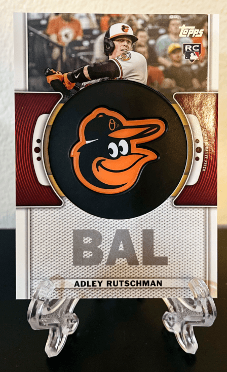 2023 Topps Series 1 Adley Rutschman Commemorative Team Logo Patch Relic Card